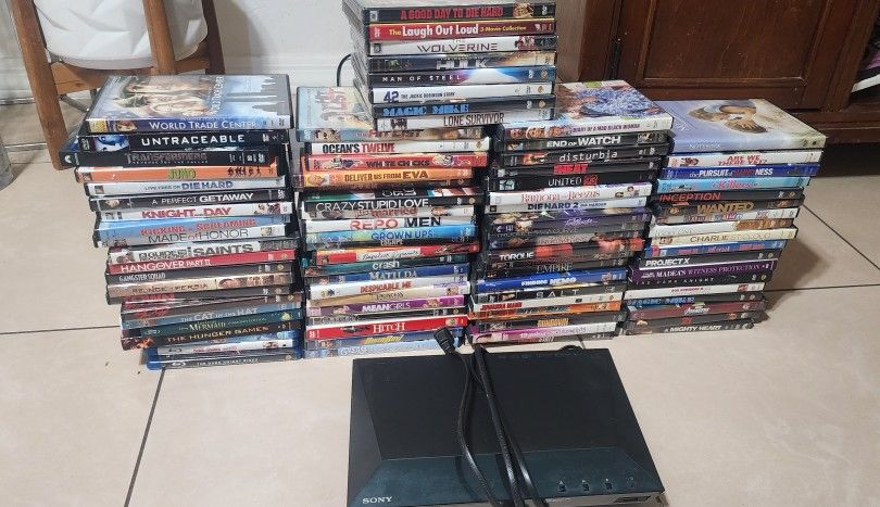 86 Dvds And DVD Player