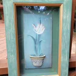 FLOWER IN A RAISED POT IN A 10"W×15"H SHADOW BOX GREEN FRAME