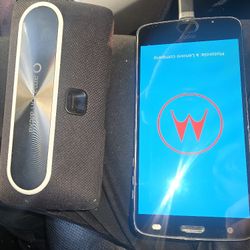 Motorola Cell & Motorola Speaker  & Charger $95