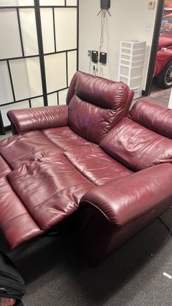 Power reclining leather sofa