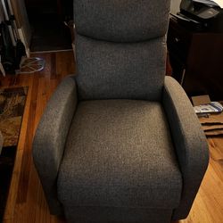 Electric massaging recliner