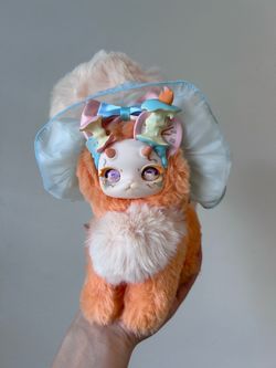 Orange tutulong plush