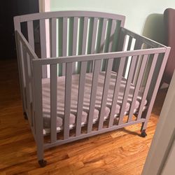 Mini Crib With Wheels