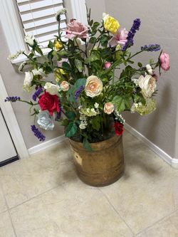 Flower pot with decorative flowers