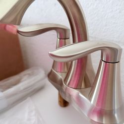 Brand new Moen brushed steel bathroom faucet for sale.