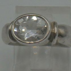 STERLING SILVER RING 5.5 GRAMS SIZE 6 WITH LIGHT WHITE STONE MINT CONDITION . 866077-5