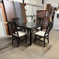 Dinning table and chairs $249