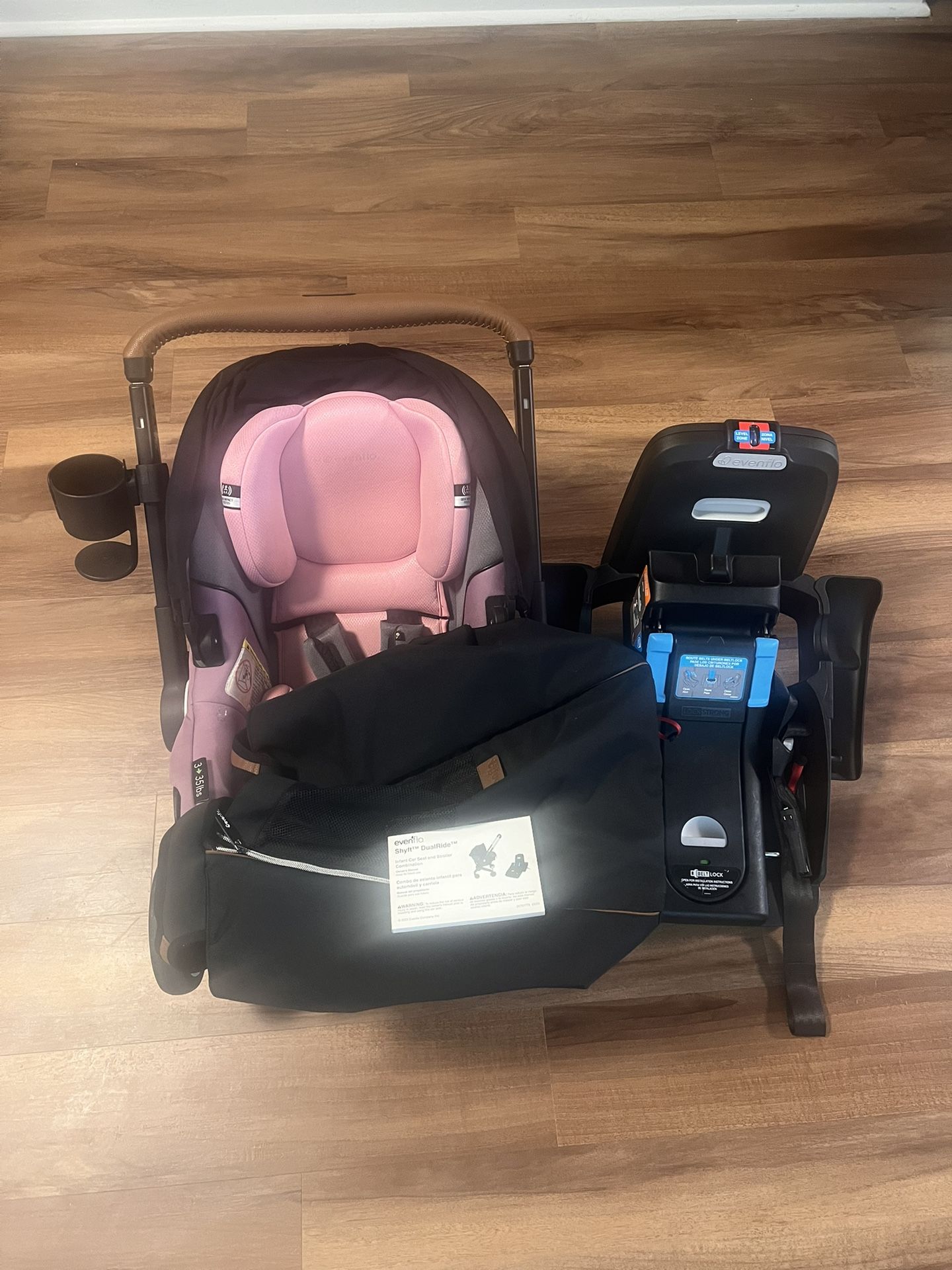 Evenflo Shyft DualRide Infant Car Seat Stroller Combo with Carryall Storage (Sylva pink)