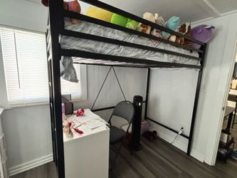 Metal twin loft bed.