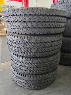 LT265-70R17 Firestone A/T tires.  95% new.
