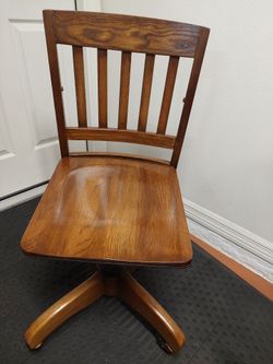 Solid Oak swivel chair