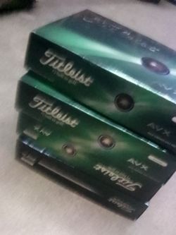 4 boxes of Titleist AVX