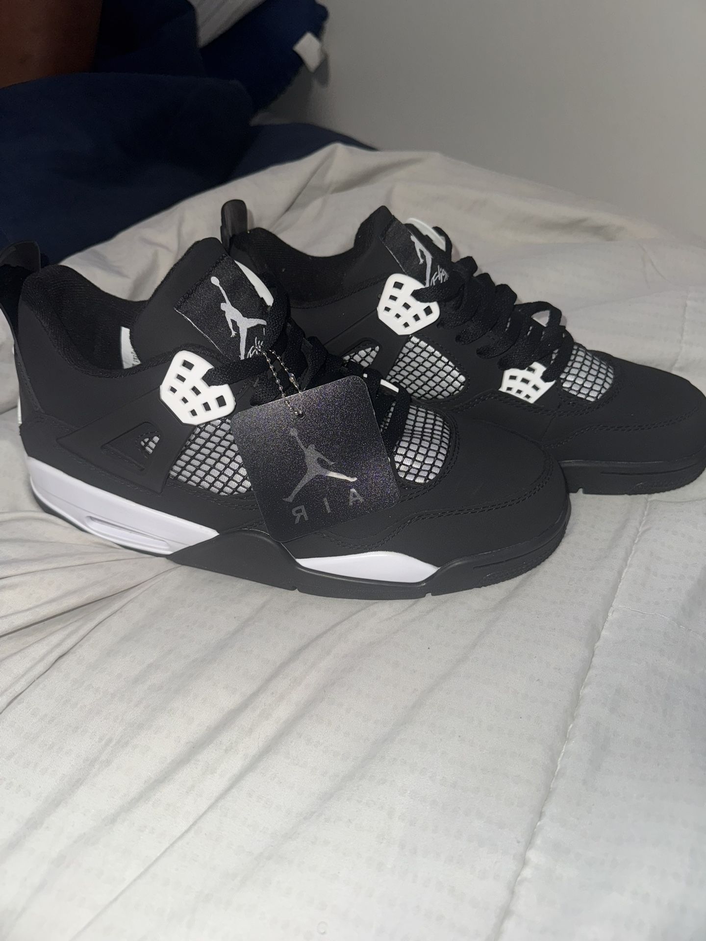 Jordan 4’s White Thunder