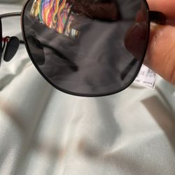 Prada Linea Rossa Shades And Versace Shades 