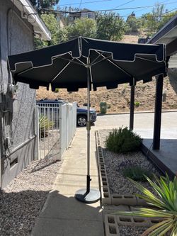 USED 9 Ft Outdoor Patio Black Umbrella- scalloped edges, crank and tilt and wind vent on top