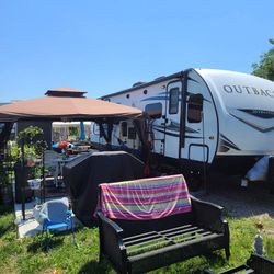 Keystone Outback Travel Trailer, 33 Feet Long, Asking 12,500.