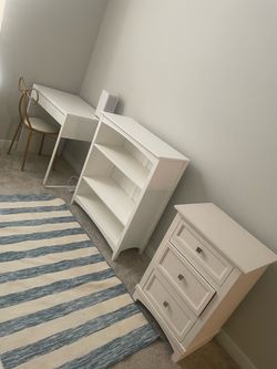 Whitewood desk, white shelving storage and table moving must go