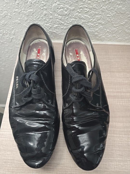 Prada Oxford Lace Up Black Patent Leather Finish Flat Shoes.  Size Women's 39