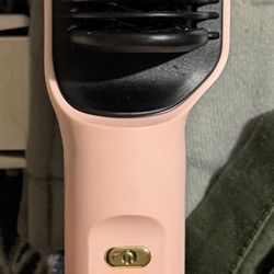 This hair straightening brush has been stored but never used as u can see in the photo. So it’s basically new without a box located off Lake Mead and 