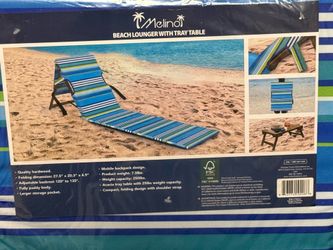 Beach lounger with tray table