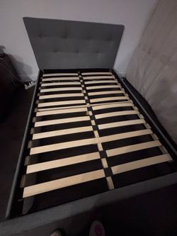 Gray upholstered platform bed frame + footboard - full size