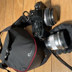Olympus EM5 Camera Package With Panasonic Lumix 20mm And Olympus 45mm Lenses