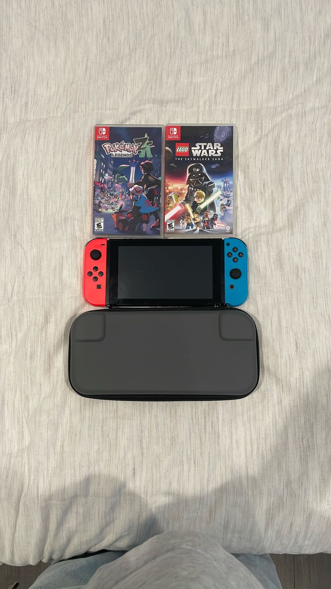 Nintendo Switch Used Very Good Condition Comes With 3 Games Pokemon Legends ZA, Star Wars,  And Party Arcade. Also Comes With A Nintendo Case 