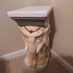 Elephant Plant Stand table
Very nice shape. 24" tall x 10" wide x 12" deep.