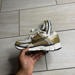 Vomero 5 “metallic Gold”  Women Size 8 