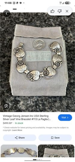Vintage signed sterling silver Georg Jensen hand wrought link bracelet. Beautiful flowing design on each leaf and tendril link. It is marked on the ba