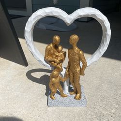 Statue of a Family of Four