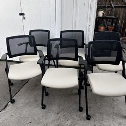 6 excellent beige leather Kimball chairs with wheels, $25 each