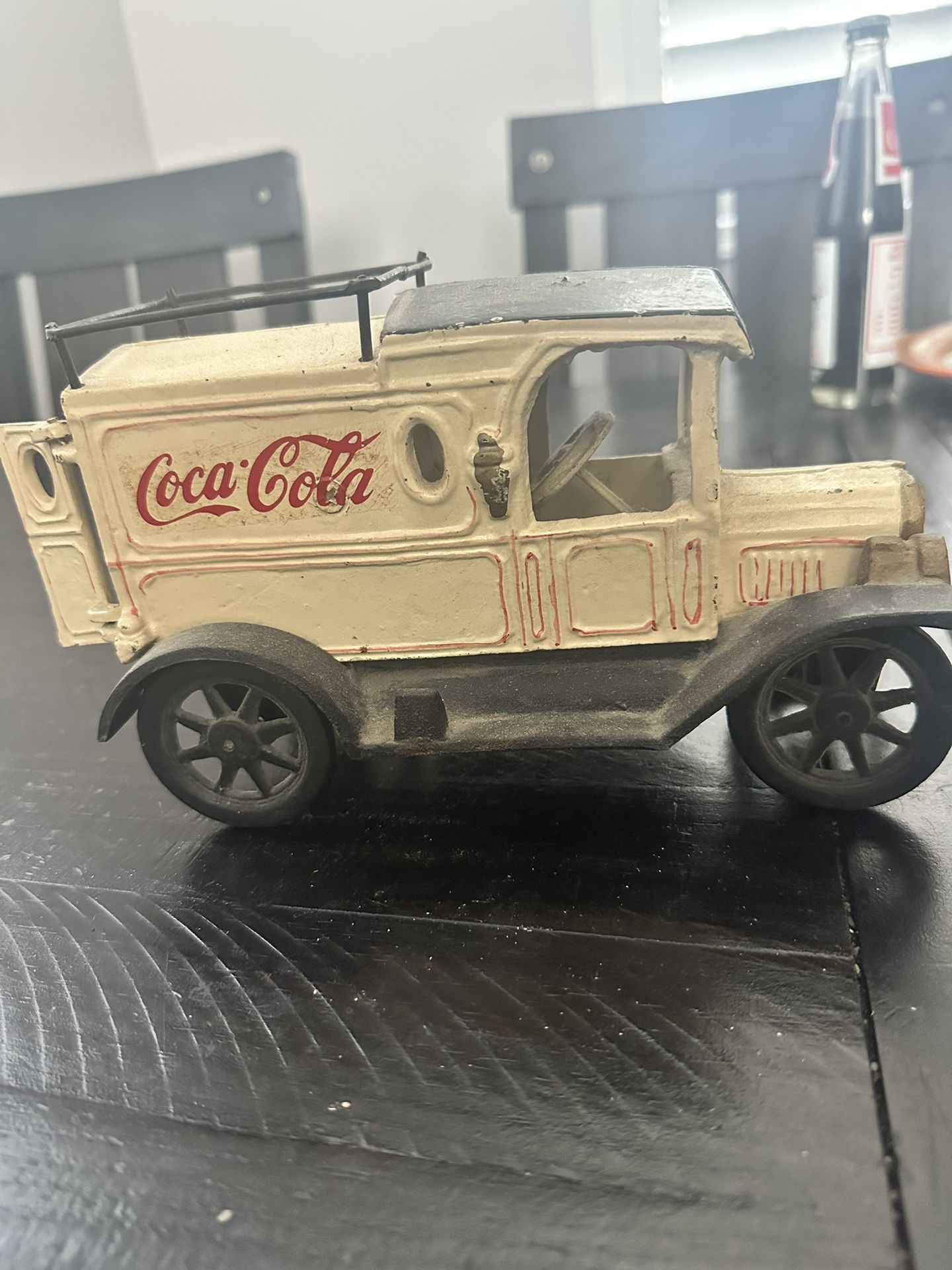 vintage-style Coca-Cola cast iron delivery truck.