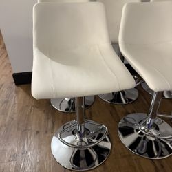 Six White Leather Bar Stools