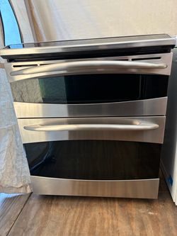 GE slide in double oven range / stove