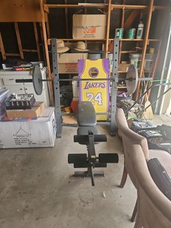 Bench/Squat Rack With Two 45 Lb. Weights