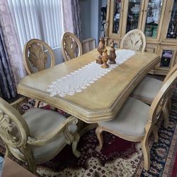 Anyone interested in a dining room table with 2 leaf extensions? My Mom is selling her home along with other furniture. $750 for the table, extension 