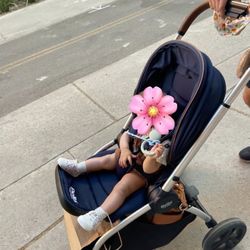 Revolve stroller and attachable bassinet