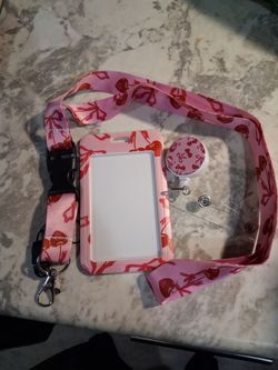 Card holder with clip and lanyard