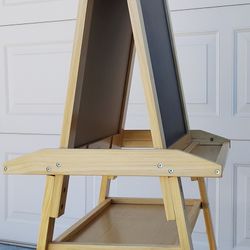 Double-Sided Wooden Art Easel - $[Price]
​Keep the kids creative and the mess organized! This sturdy, natural wood easel is in great condition and rea