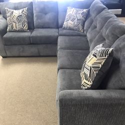 Tufted Grey sectional With Pillows
