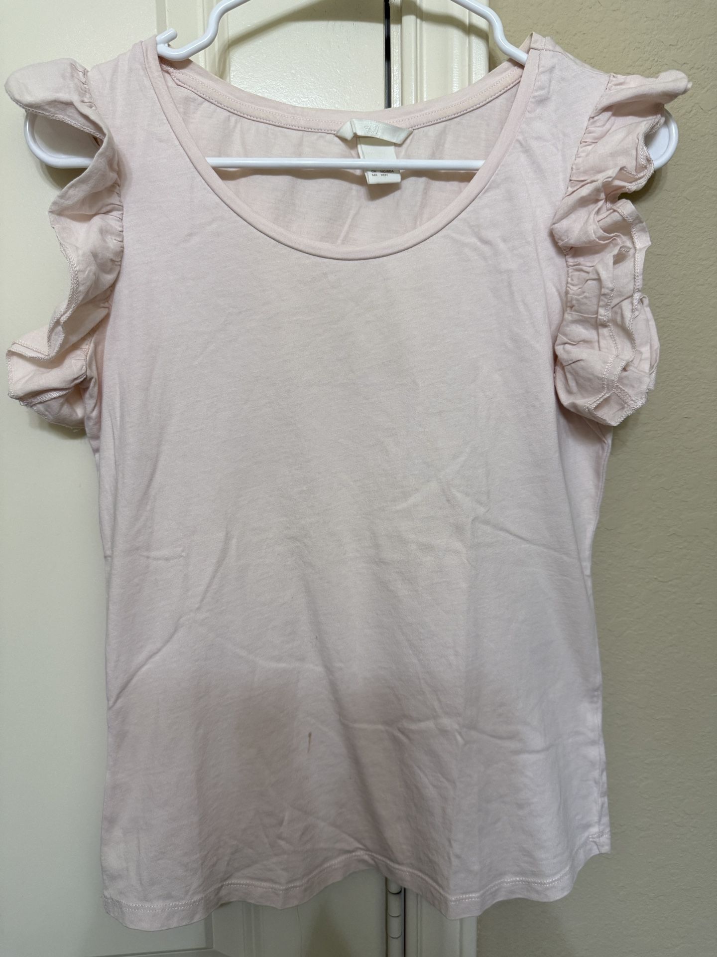 Used-H & M pink ruffle sleeve tee- size XS.
