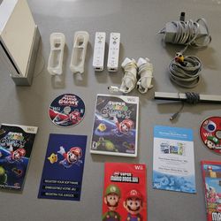 White Nintendo Wii Console, Accessories, & Two Great Mario Games
