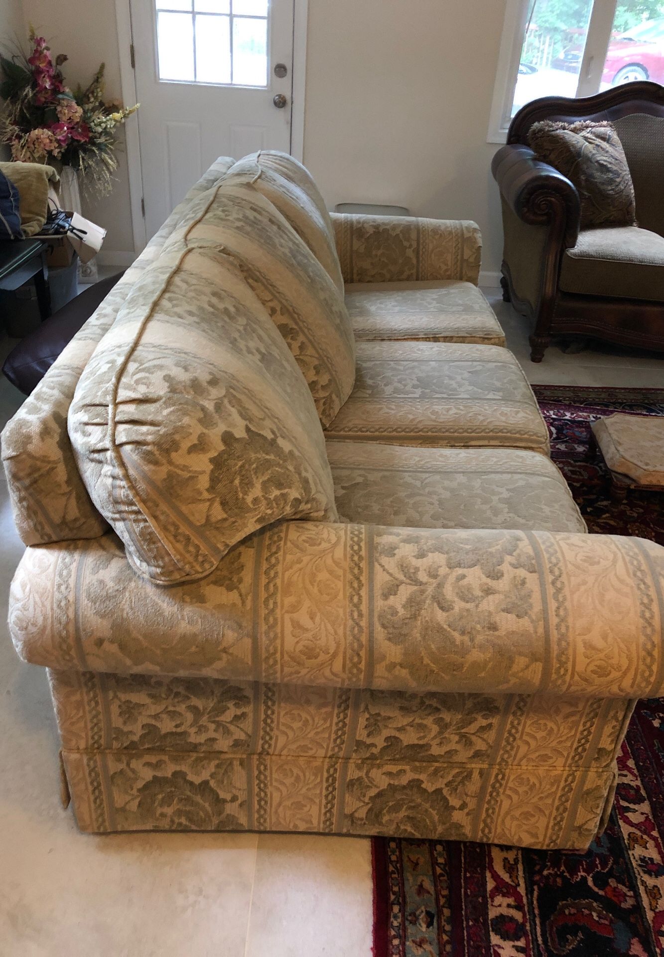Long Couch -Tan colored. Great condition