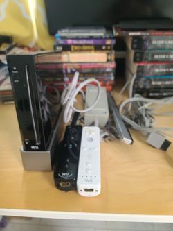 Nintendo wii black system with Mario party 8 disc inside