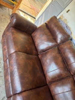 Brown Leather Reclining Sofa and loveseat