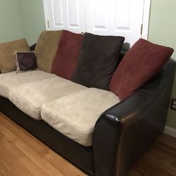 Comfy mint condition semi leather couch w cushions