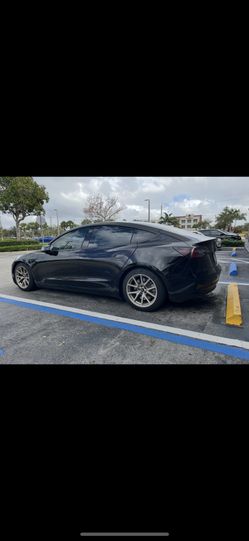 Tesla model 3 all 4 tires, and 18” OEM magnesium 1 off colored wheels, Gorilla locks, oem tpms sensors, all 5 weather proof floor mats + sun visors