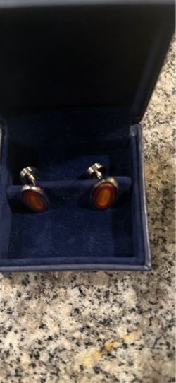 Watch and shades and cuff links