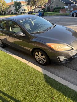 2010  mazda3 dark grey$4400.